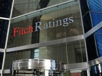 Fitch büyüme tahminini düşürdü