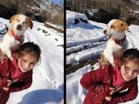 Küçük Cemre hastalanan köpeğini sırtında veterinere götürdü