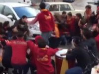 Otomobil taraftarların arasına daldı