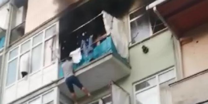 Yanan evin balkonundan alt kata atladı